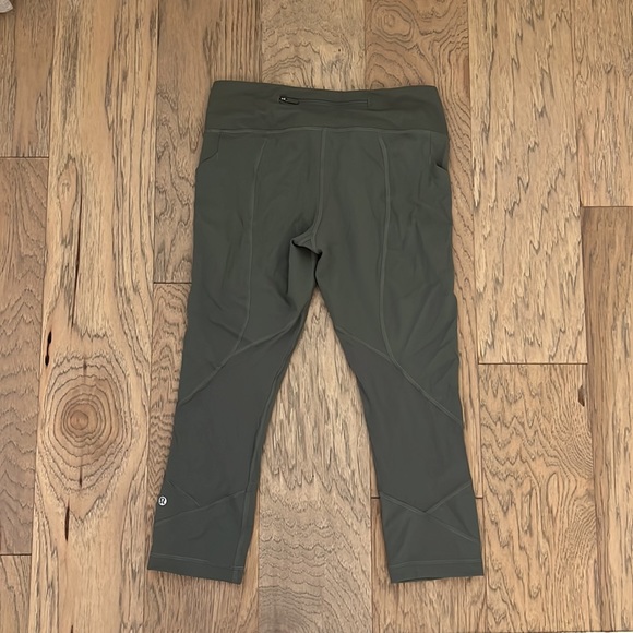 Olive green Lululemon leggings, hit at mid-calf with pockets galore!! - Picture 3 of 9